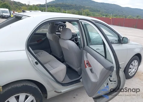 2003 Toyota Corolla Le из США, поврежденный, VIN 2T1BR32E83C012027